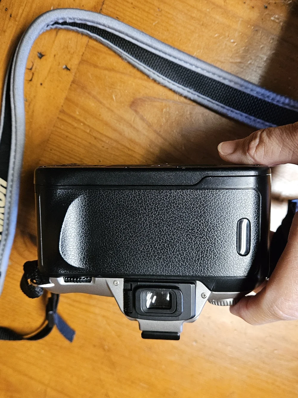 Nikon N55 35mm SLR Film Camera with Black Zoom Lens and Strap